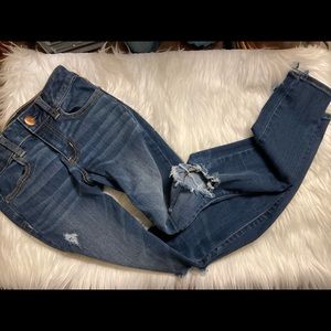 american eagle dark wash slightly ripped jeans